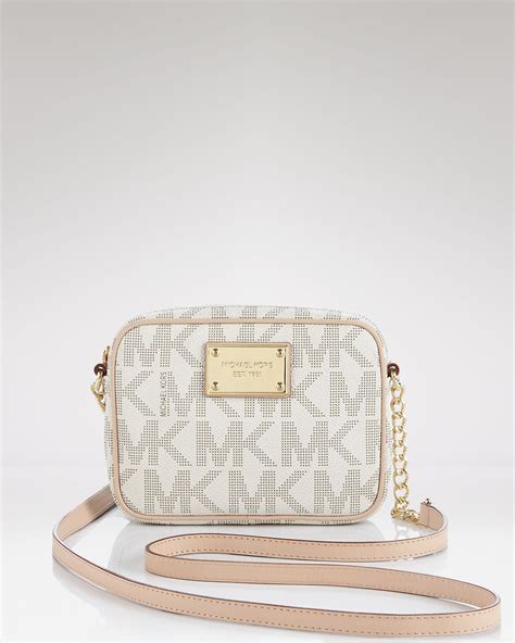 michael kors crossbody cognac and white|Michael Kors handbags.